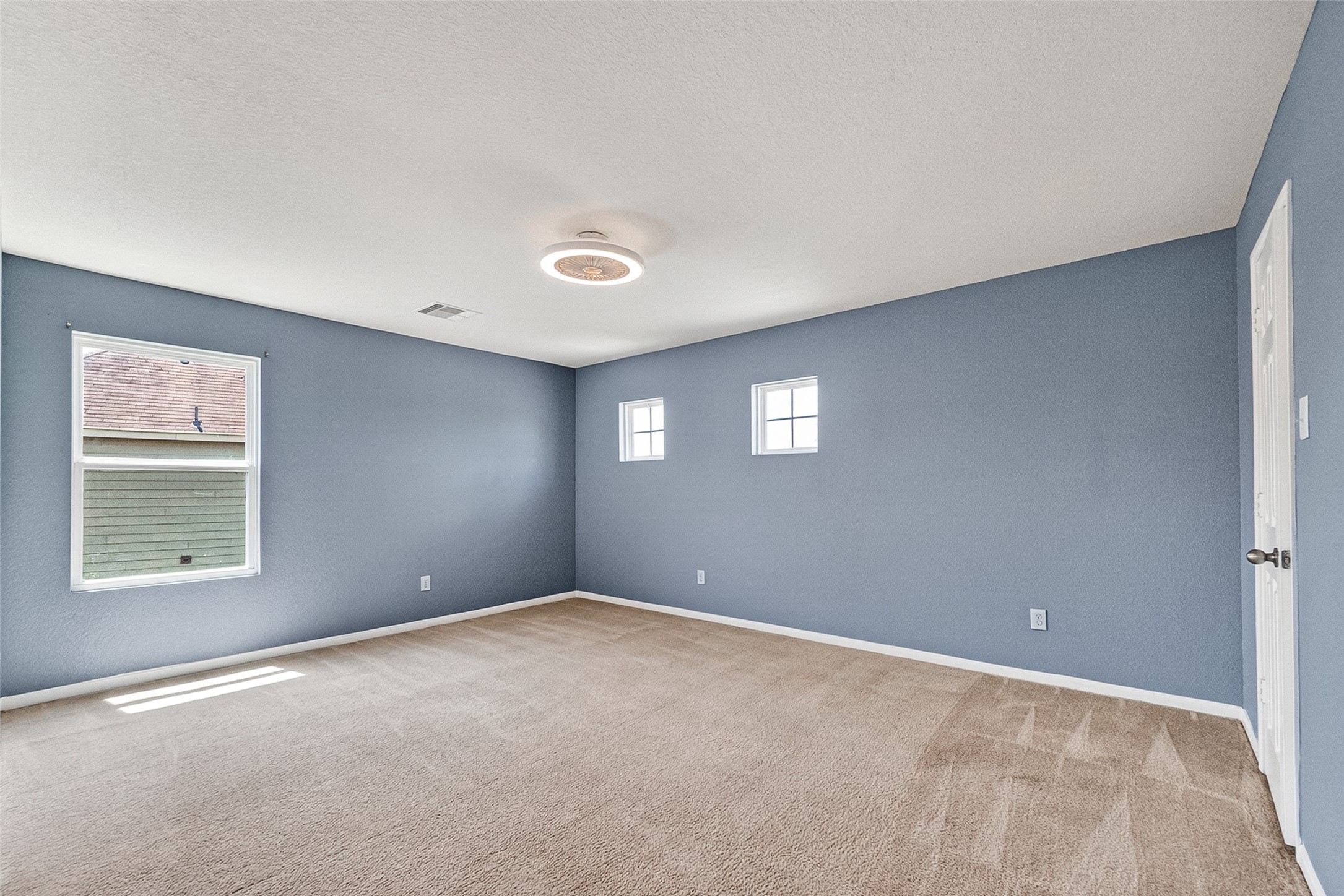 2702 Modano Court Fresno, TX 77545 - Photo 25 of 46 a view of an empty room with a window