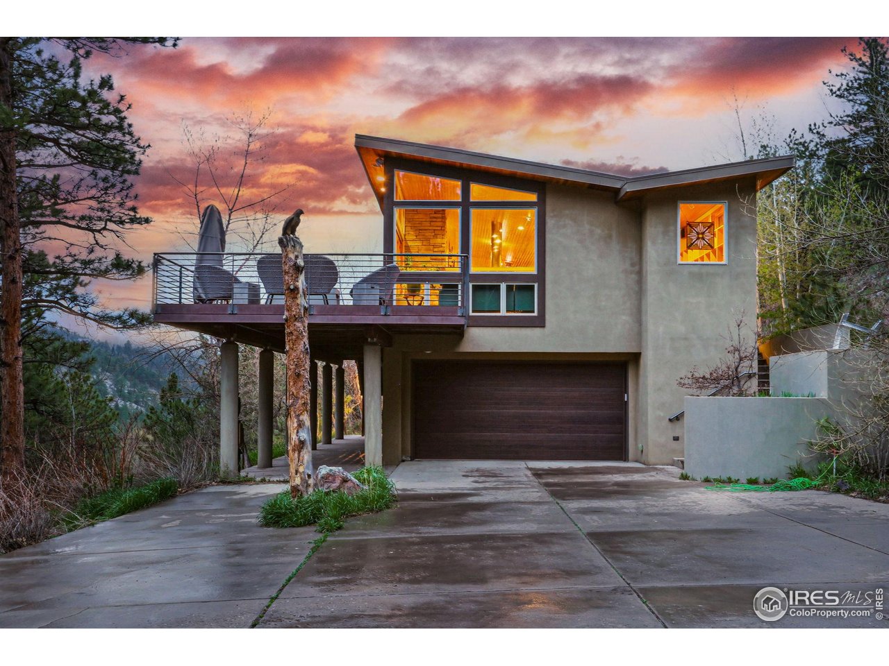 1127 Valley Lane Boulder, CO 80302 - Photo 3 of 48 a view of a house with a porch and a yard