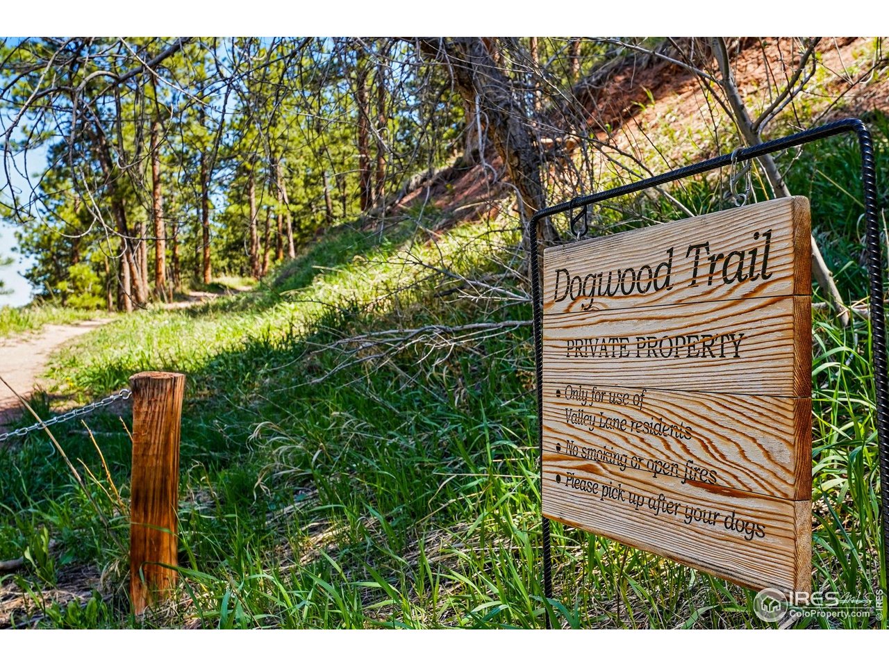 1127 Valley Lane Boulder, CO 80302 - Photo 47 of 48 a sign on the side of a road