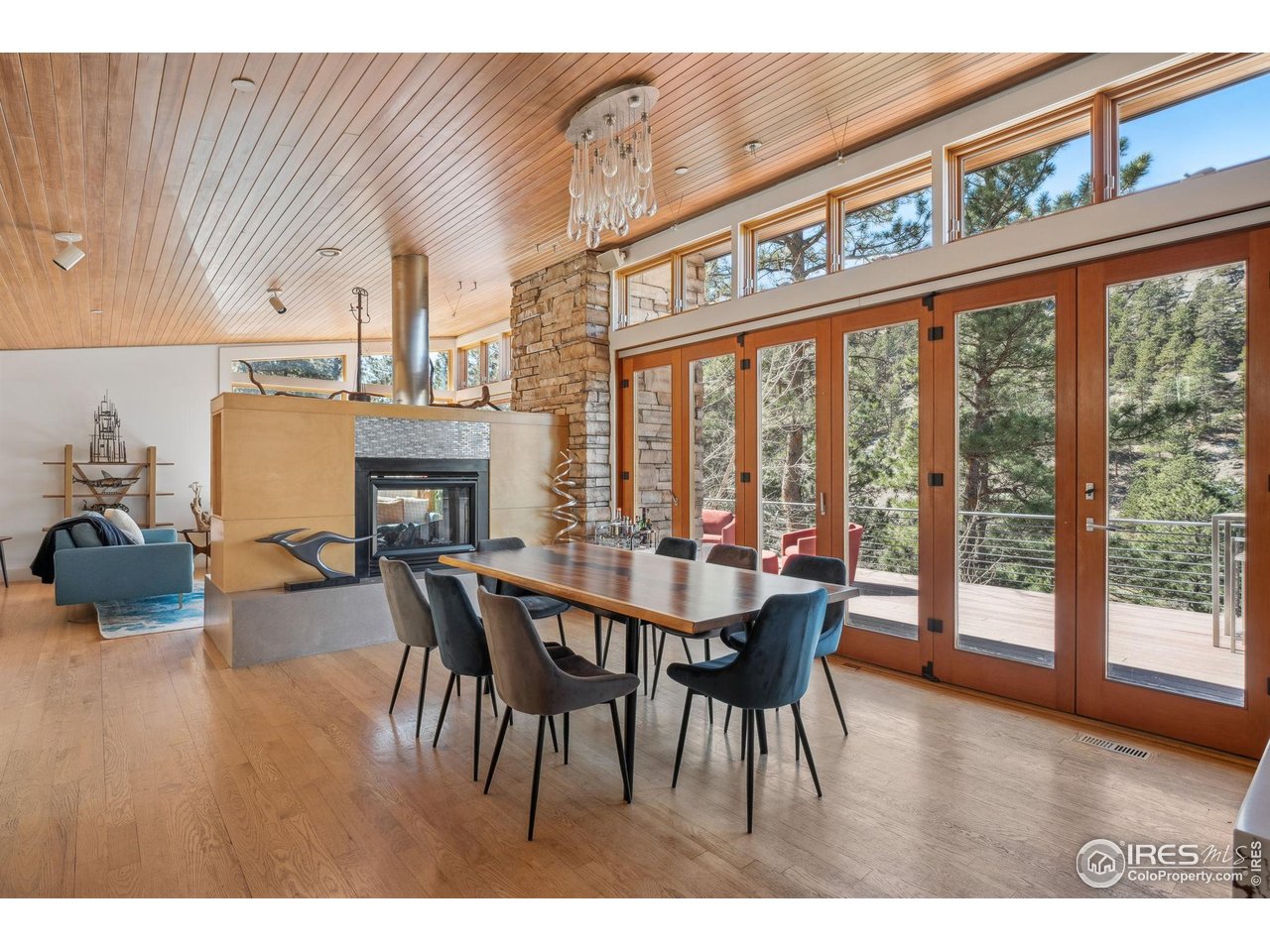 1127 Valley Lane Boulder, CO 80302 - Photo 8 of 48 a dining room with furniture window and wooden floor