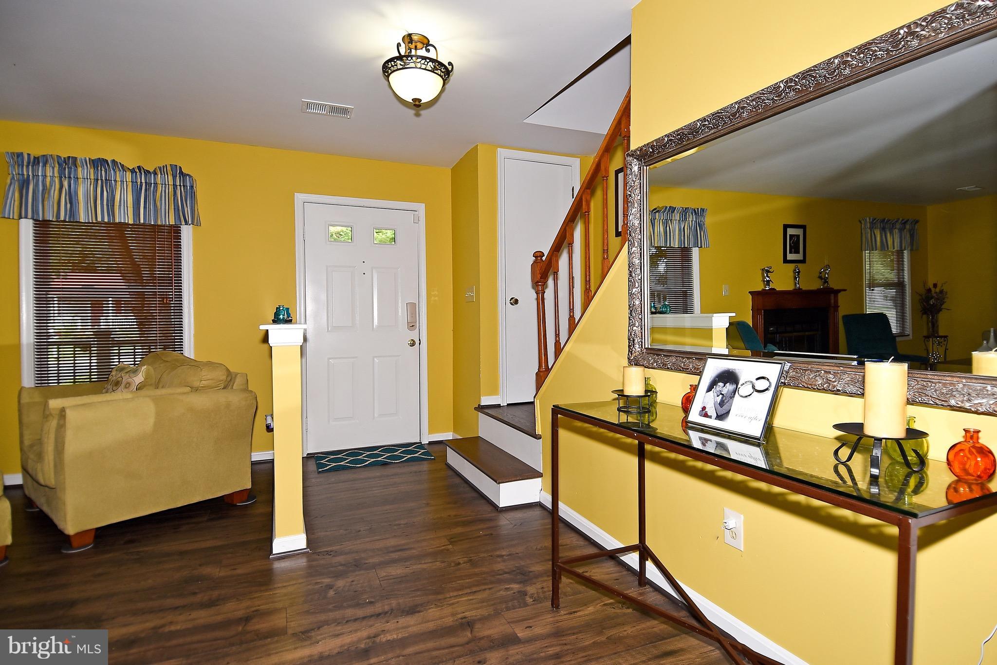 10313 Abbott Road Manassas, VA 20110 - Photo 2 of 30 a view of living room with furniture and flat screen tv