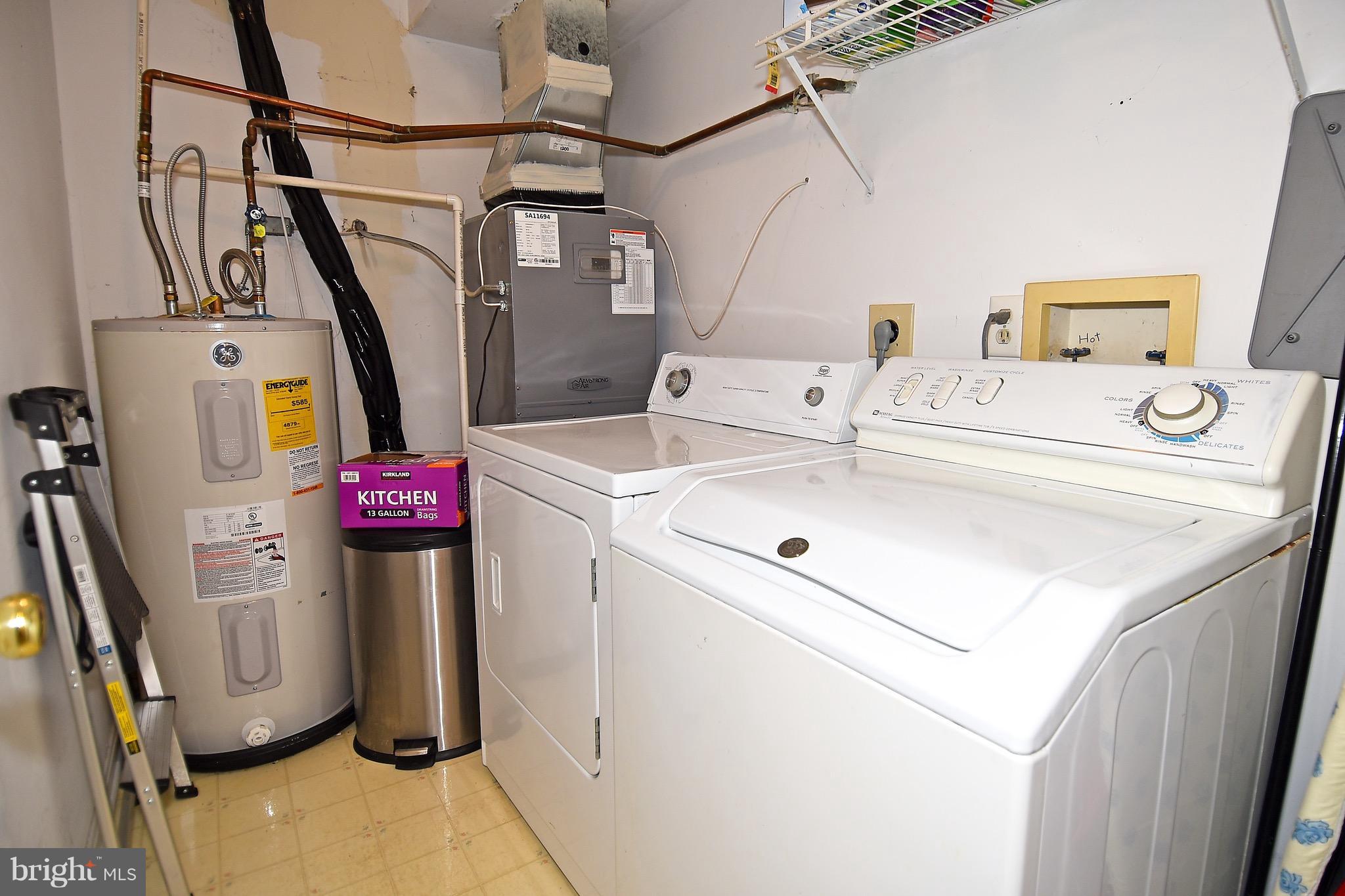 10313 Abbott Road Manassas, VA 20110 - Photo 16 of 30 a utility room with dryer and washer