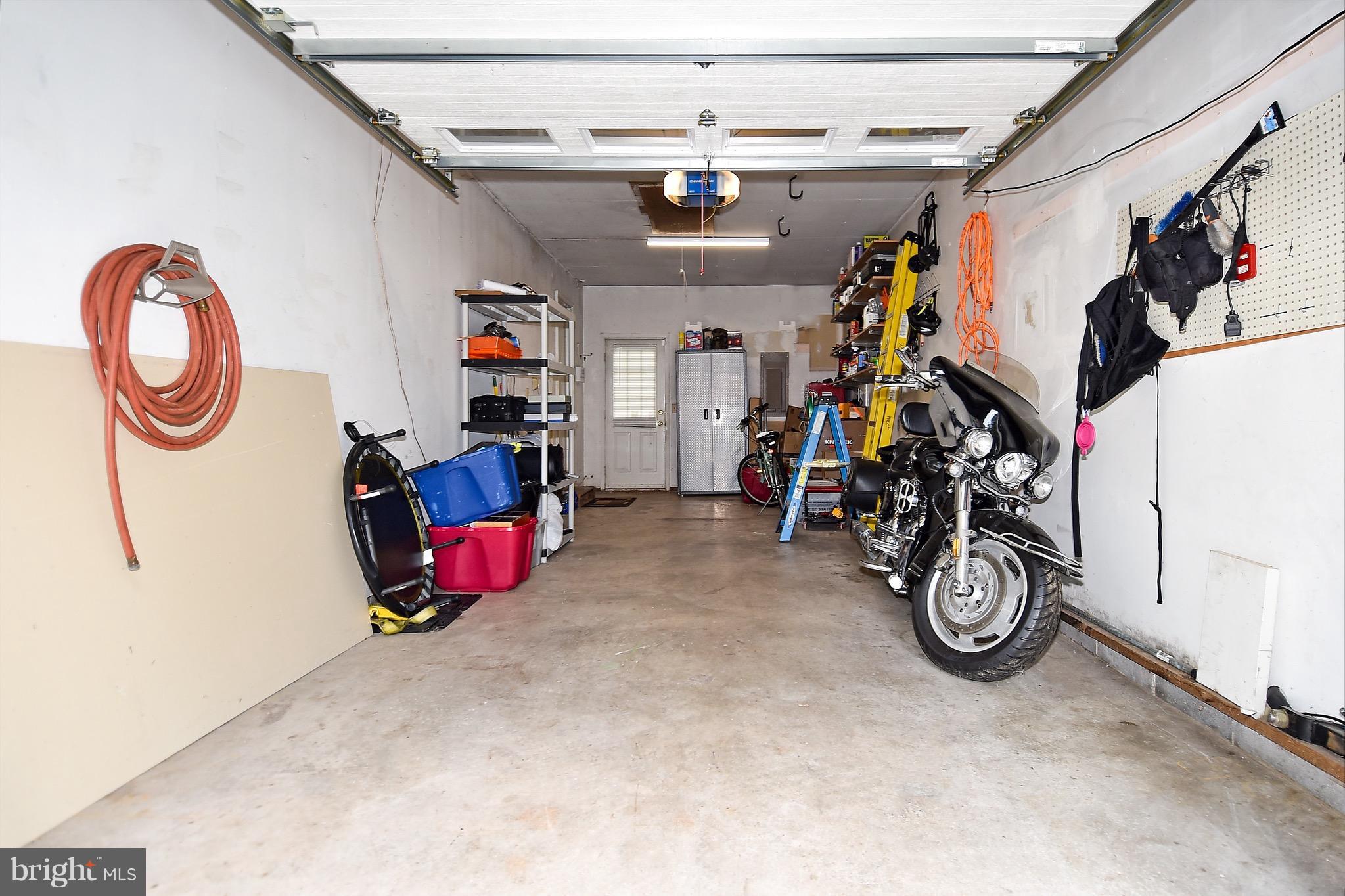 10313 Abbott Road Manassas, VA 20110 - Photo 29 of 30 a view of garage with bicycles