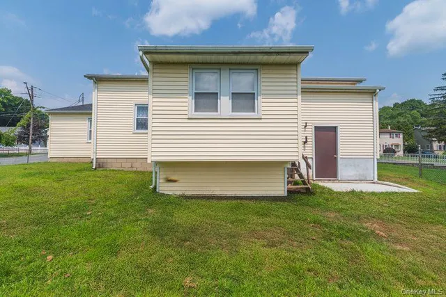 a view of a backyard with a garden