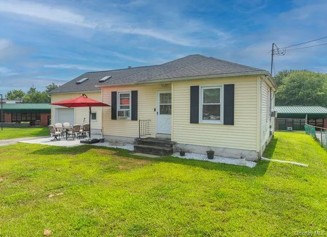a view of a house with a swimming pool