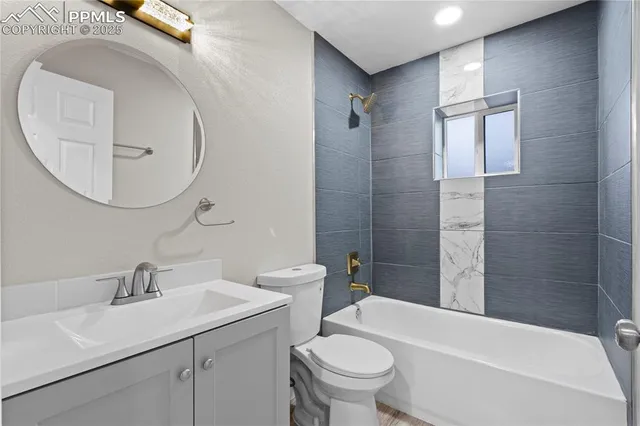 a view of a backyard with wooden fence