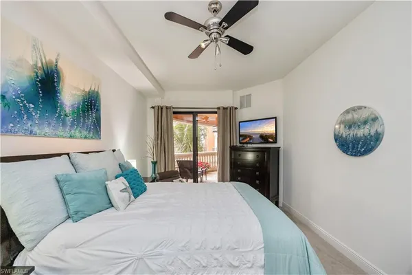 a large bathroom with a double vanity sink a large mirror and a bathtub
