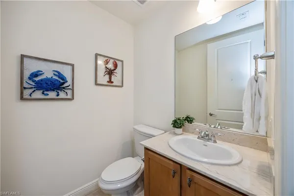 a view of a two chairs in the balcony