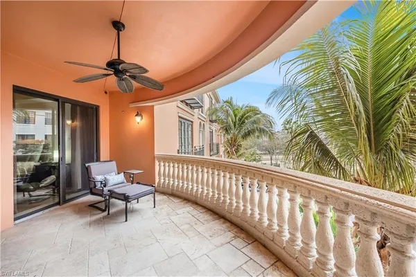 a view of a porch with furniture
