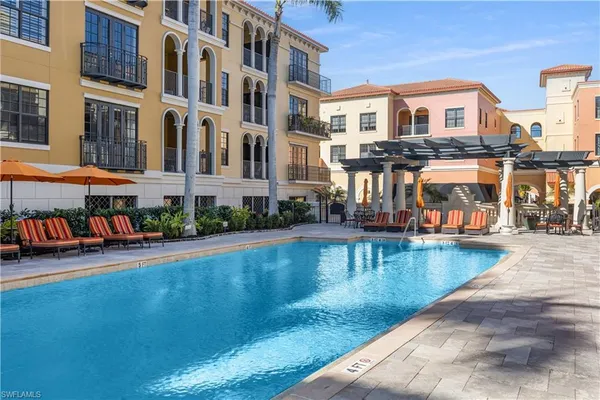an aerial view of residential building with parking space