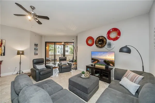 a view of a bathroom with a granite countertop sink mirror and a shower