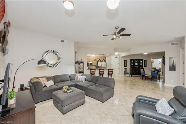 a living room with furniture and a table
