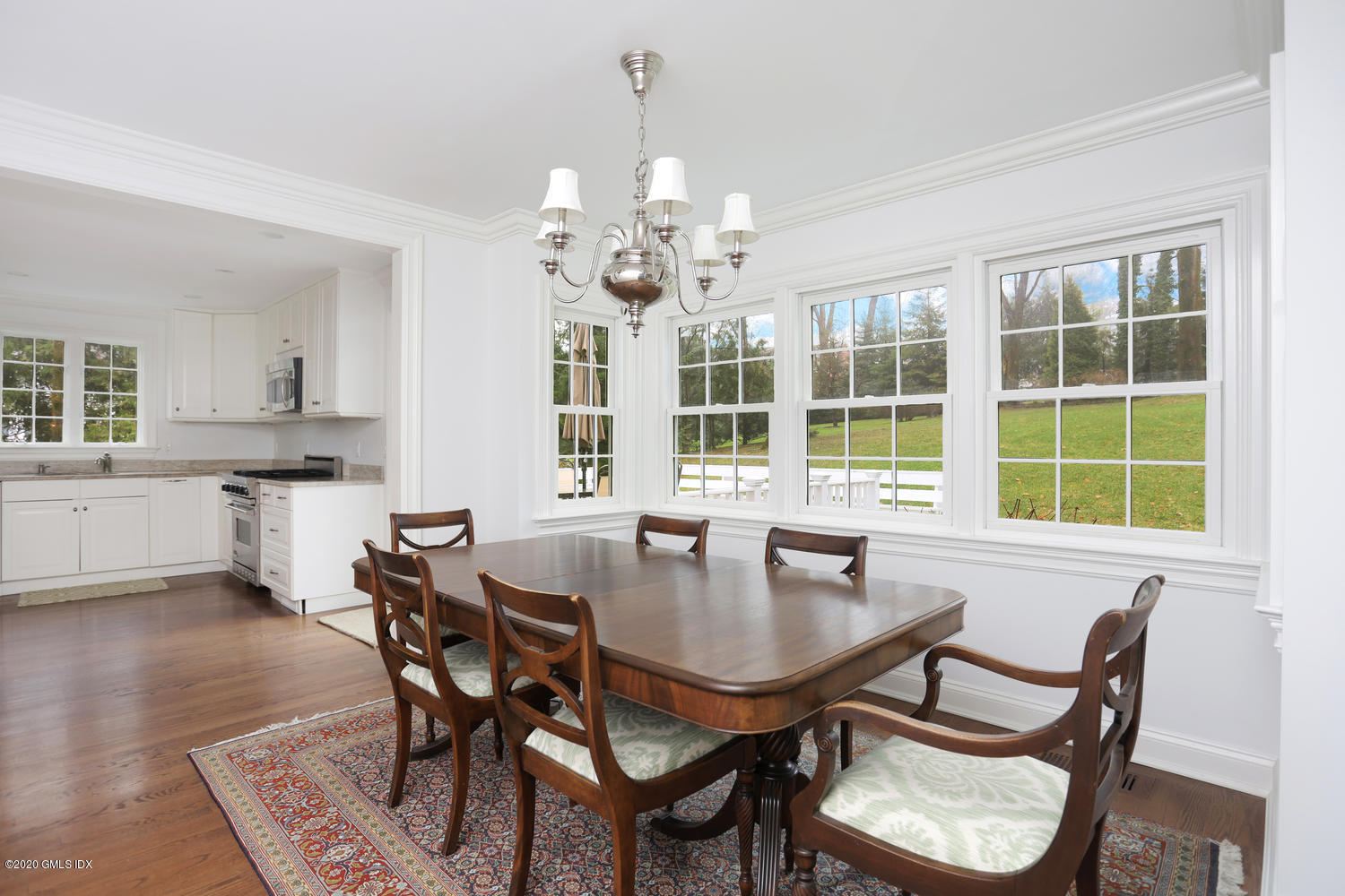 17 Hillside Drive Greenwich, CT 06830 - Photo 3 of 18 a dining room with furniture window and wooden floor