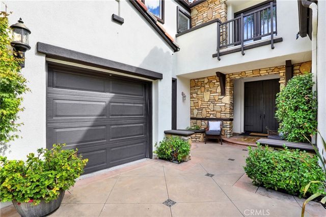 a kitchen with stainless steel appliances a stove a sink and a wooden floors