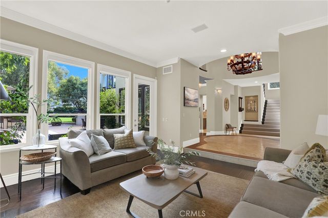 a view of a balcony with furniture
