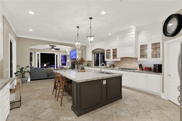 a work room with furniture and a window