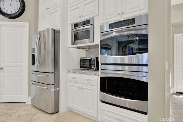 a house view with a sitting space and garden