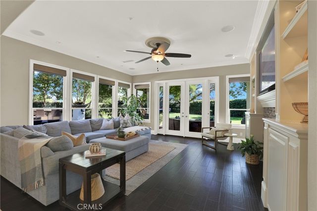 a view of a patio with chairs and a fire pit