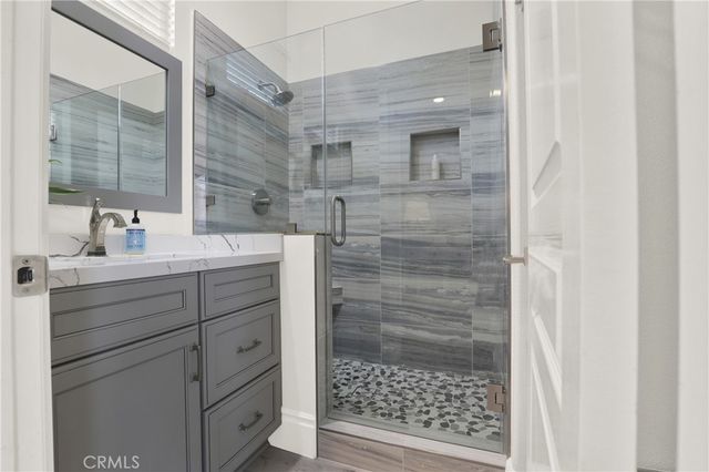 a view of a park with large trees