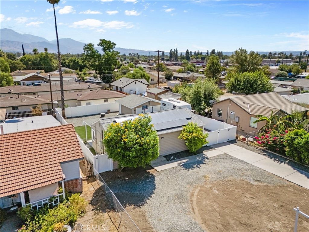 7167 Osbun Road San Bernardino, CA 92404 - Photo 13 of 35 a picture of houses with a yard