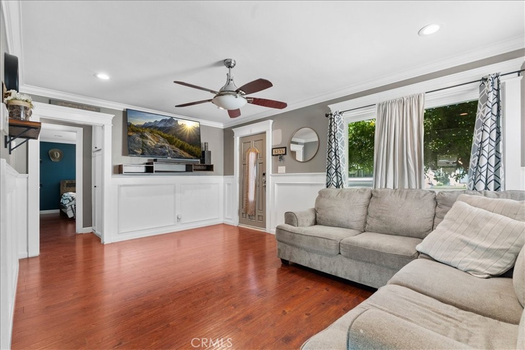 7167 Osbun Road San Bernardino, CA 92404 - Photo 21 of 35 a living room with furniture and a large window