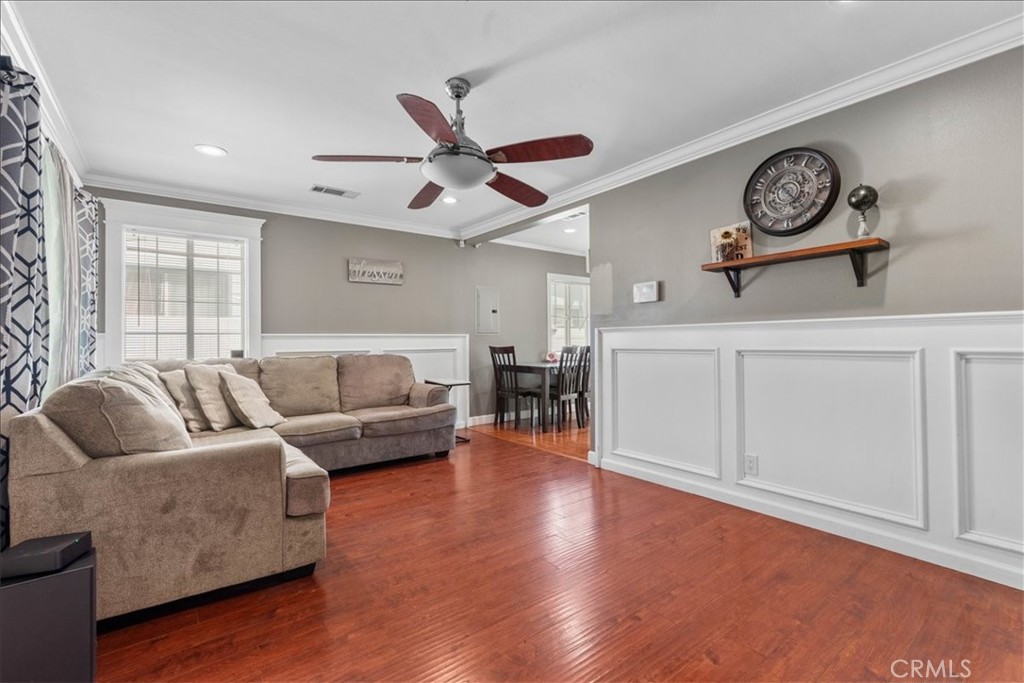 7167 Osbun Road San Bernardino, CA 92404 - Photo 23 of 35 a living room with furniture and a large window