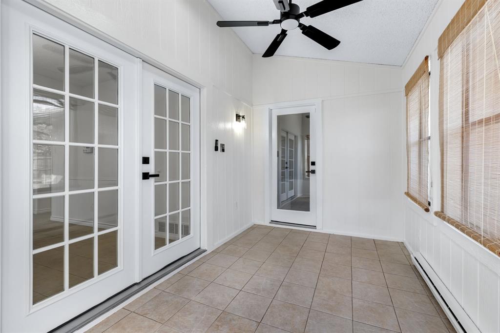 2543 Sundance Lane Dallas, TX 75287 - Photo 15 of 27 a view of an empty room with a window
