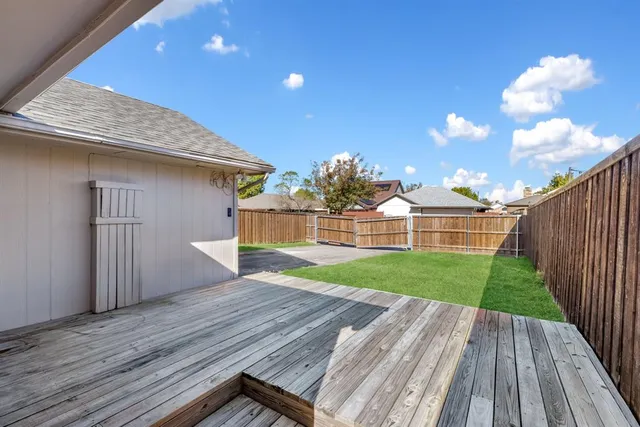 a view of a backyard with a garden