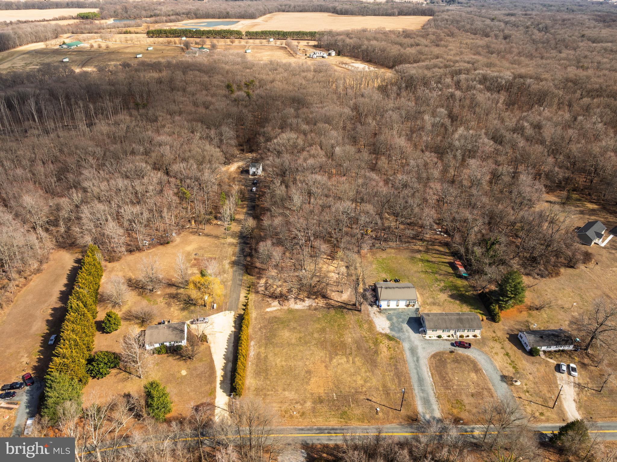 10669 Chesterville Forest Road Millington, MD 21651 - Photo 20 of 26 a view of residential houses with outdoor space