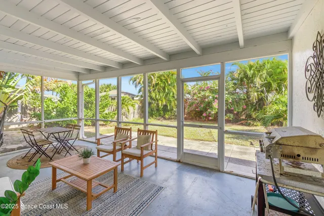 a kitchen with granite countertop a sink stove and refrigerator