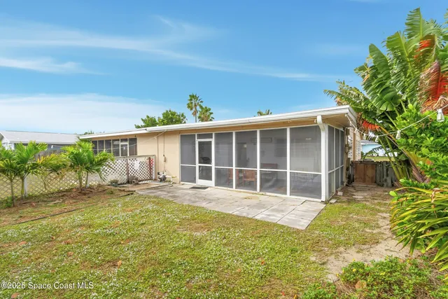 a bathroom with a sink a toilet and shower curtain