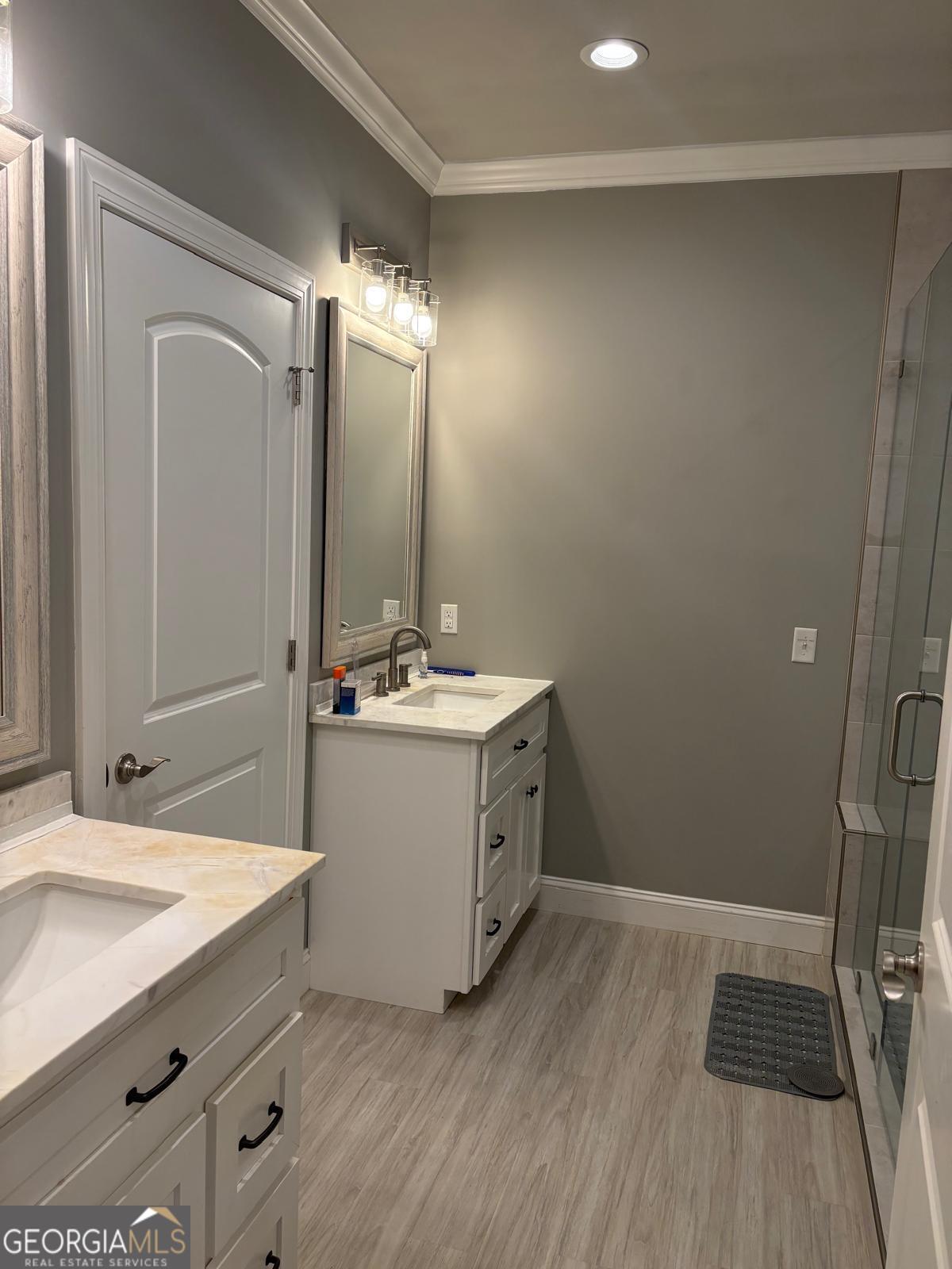 388 Forest Avenue Baxley, GA 31513 - Photo 11 of 28 a bathroom with a sink and a mirror