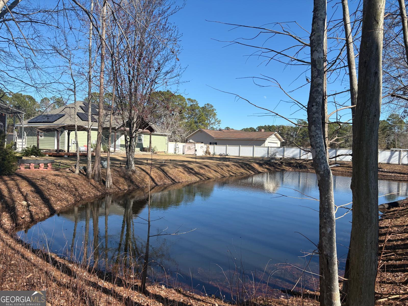 388 Forest Avenue Baxley, GA 31513 - Photo 2 of 28 a view of a backyard with a patio