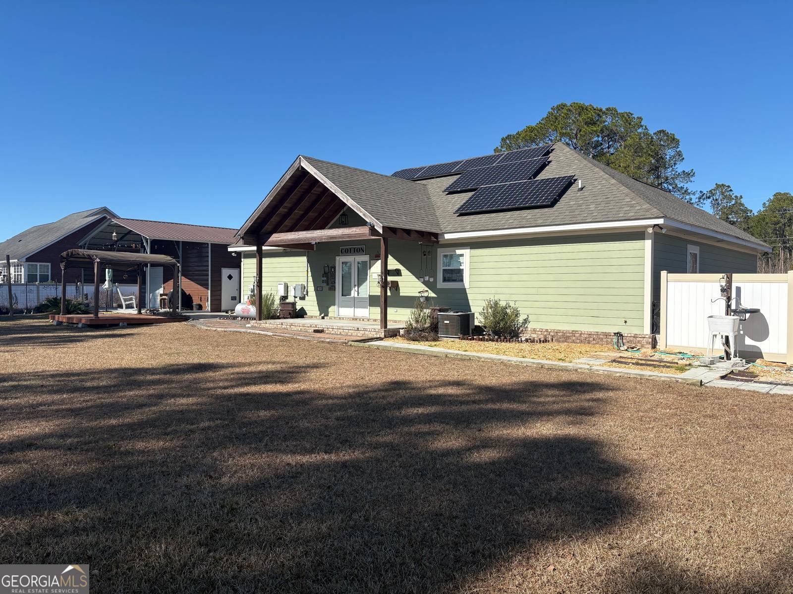388 Forest Avenue Baxley, GA 31513 - Photo 28 of 28 a front view of a house with a yard