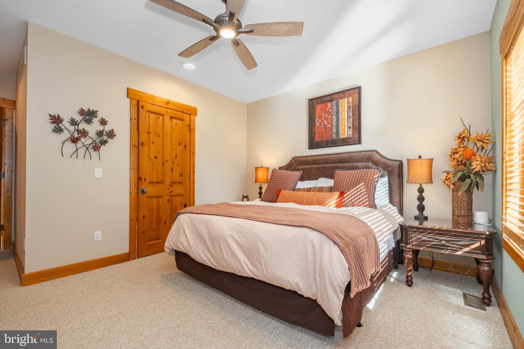 14 Ridge Run Road McHenry, MD 21541 - Photo 23 of 65 Cozy 1st floor bedroom with warm, inviting tones.