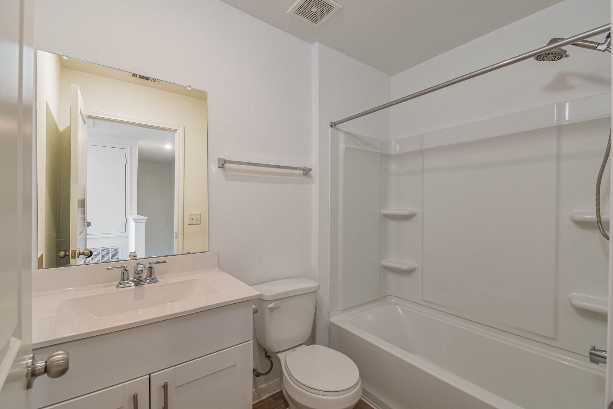 5727 Finely Run Street Spring, TX 77373 - Photo 19 of 26 a bathroom with a sink toilet and shower