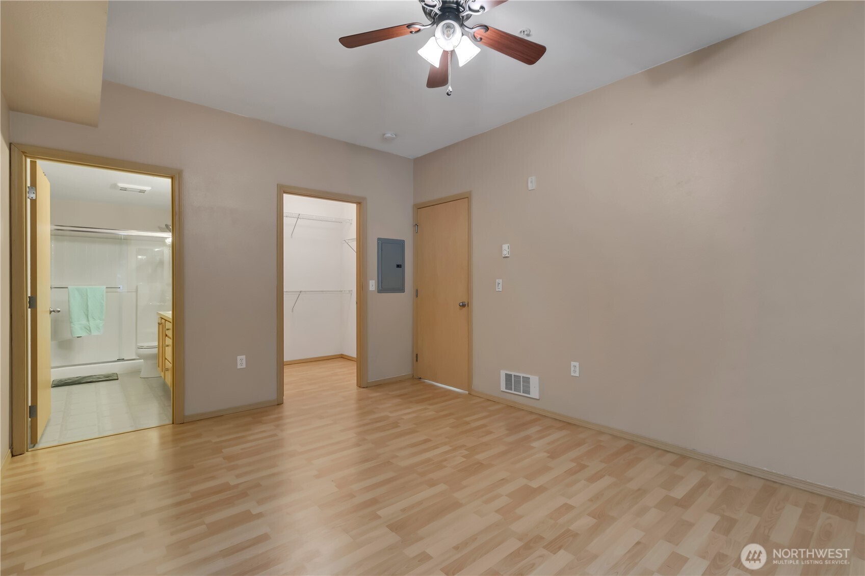 3012 Southeast 8th Place, Unit 1117 Renton, WA 98058 - Photo 14 of 28 a view of an empty room with a chandelier fan