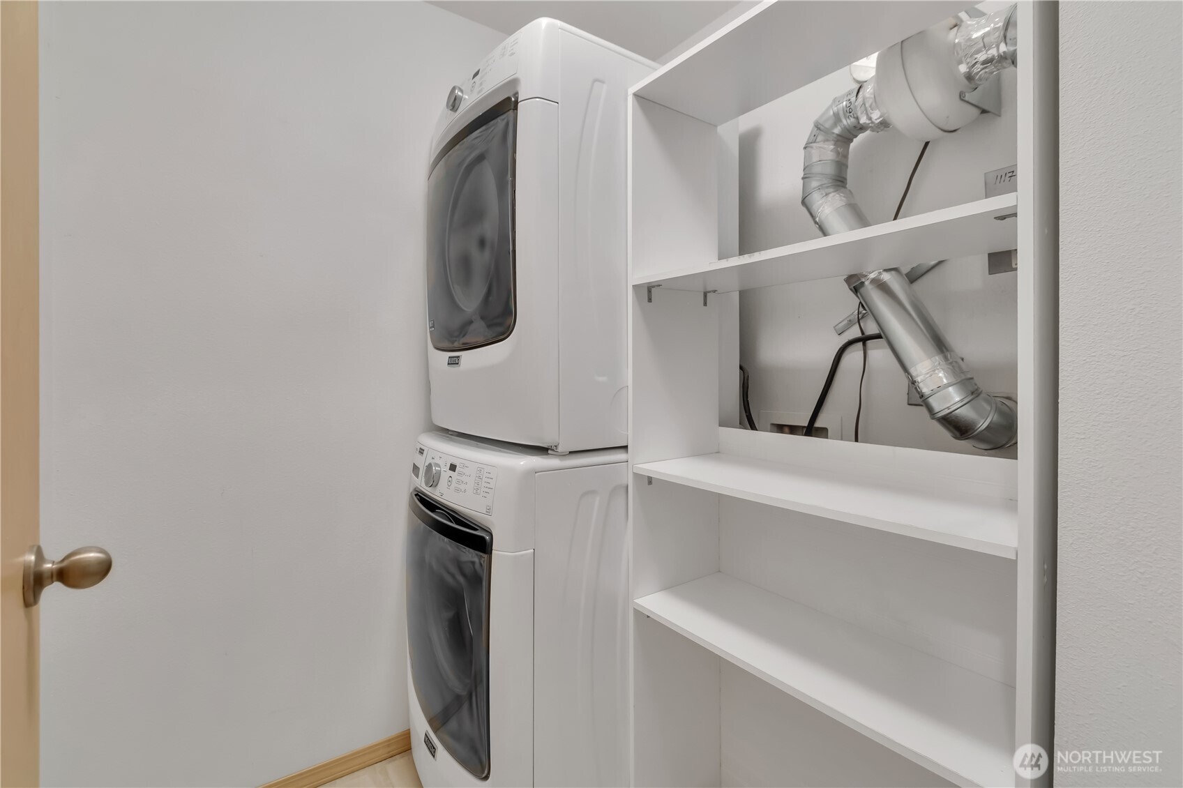 3012 Southeast 8th Place, Unit 1117 Renton, WA 98058 - Photo 18 of 28 a close view of walk in closet