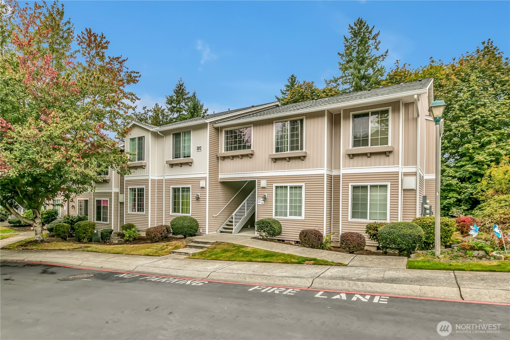3012 Southeast 8th Place, Unit 1117 Renton, WA 98058 - Photo 2 of 28 front view of a house