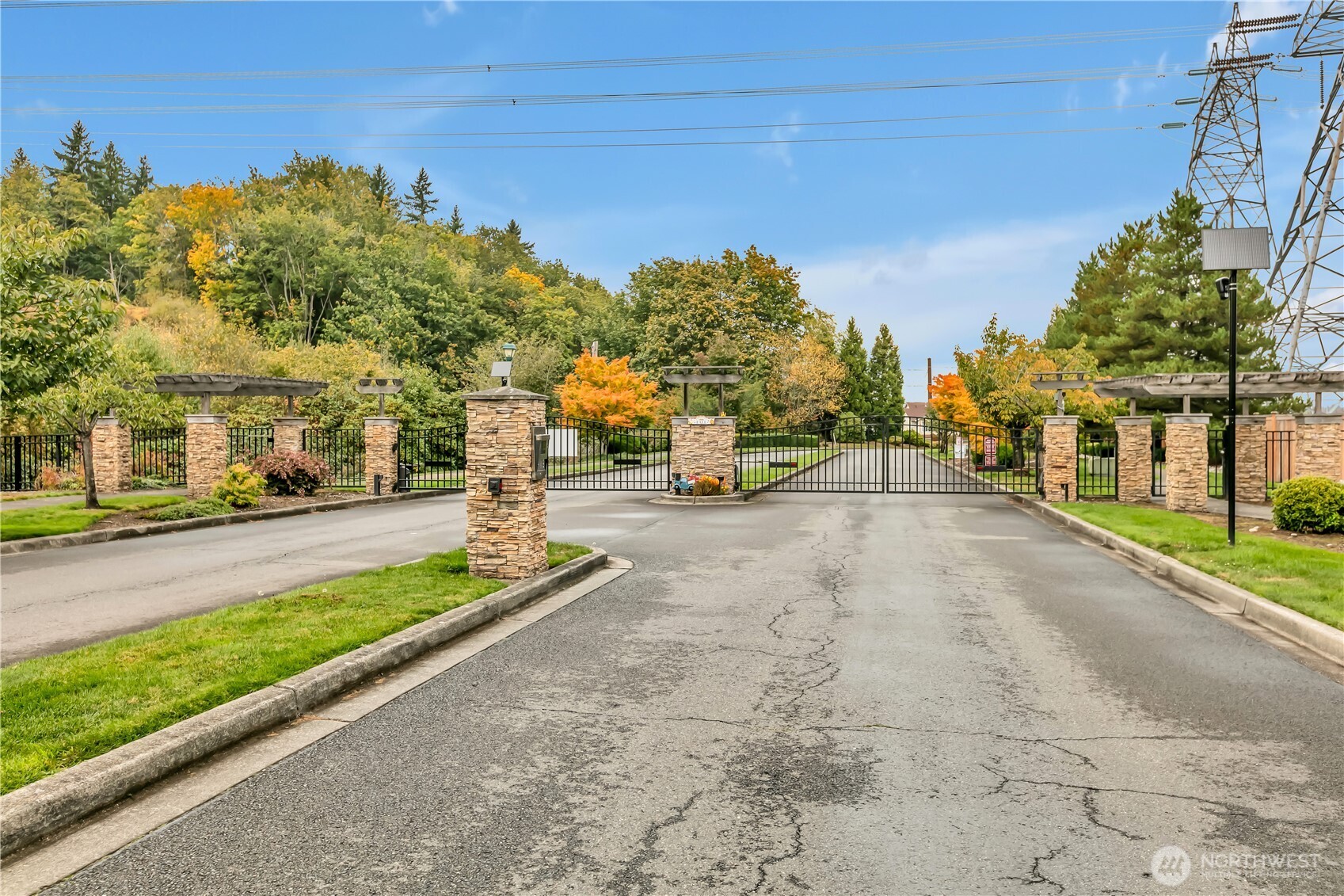 3012 Southeast 8th Place, Unit 1117 Renton, WA 98058 - Photo 28 of 28 a view of a street with houses