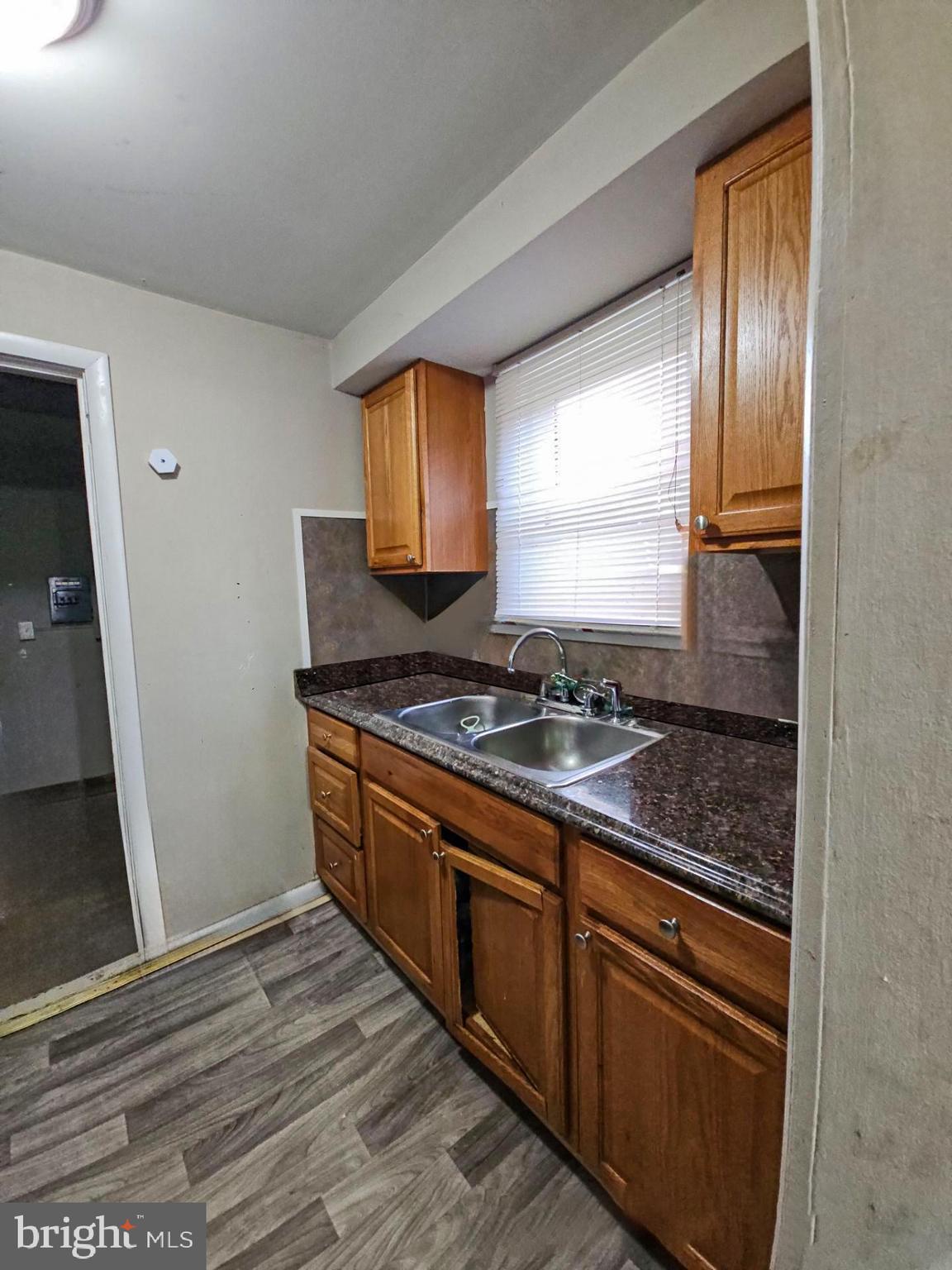 39 Maplewood Avenue Carneys Point, NJ 08069 - Photo 5 of 9 a kitchen with stainless steel appliances granite countertop a stove and a sink