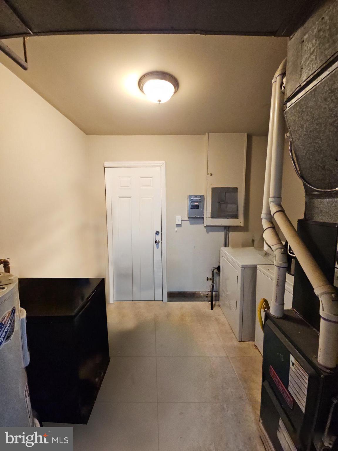 39 Maplewood Avenue Carneys Point, NJ 08069 - Photo 6 of 9 a living room with furniture and a flat screen tv