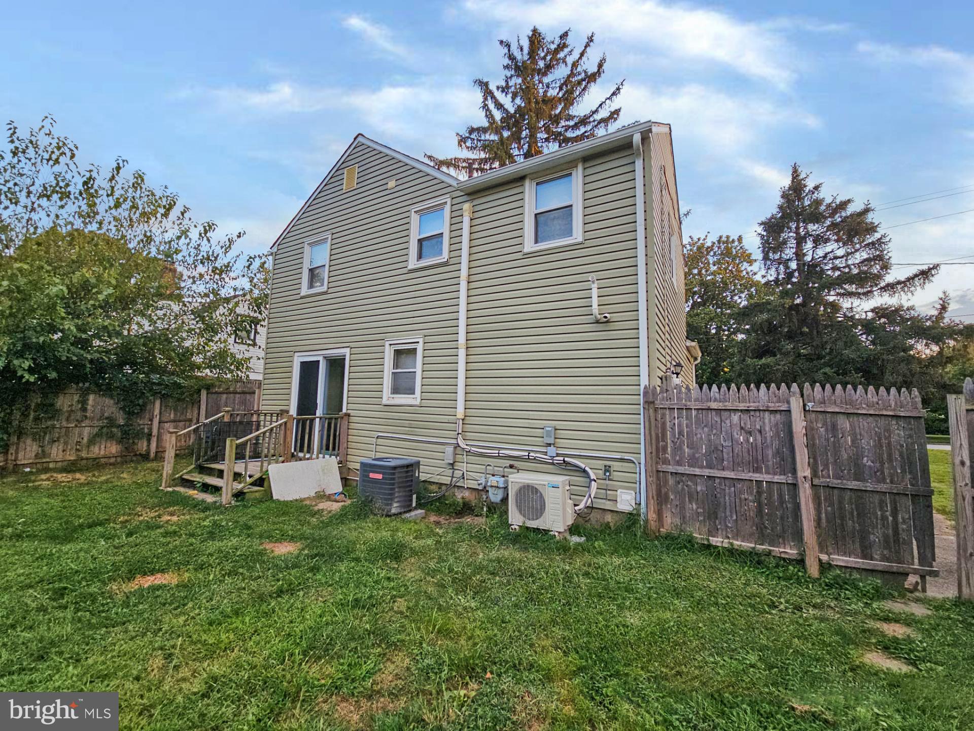 39 Maplewood Avenue Carneys Point, NJ 08069 - Photo 9 of 9 a front view of a house with garden