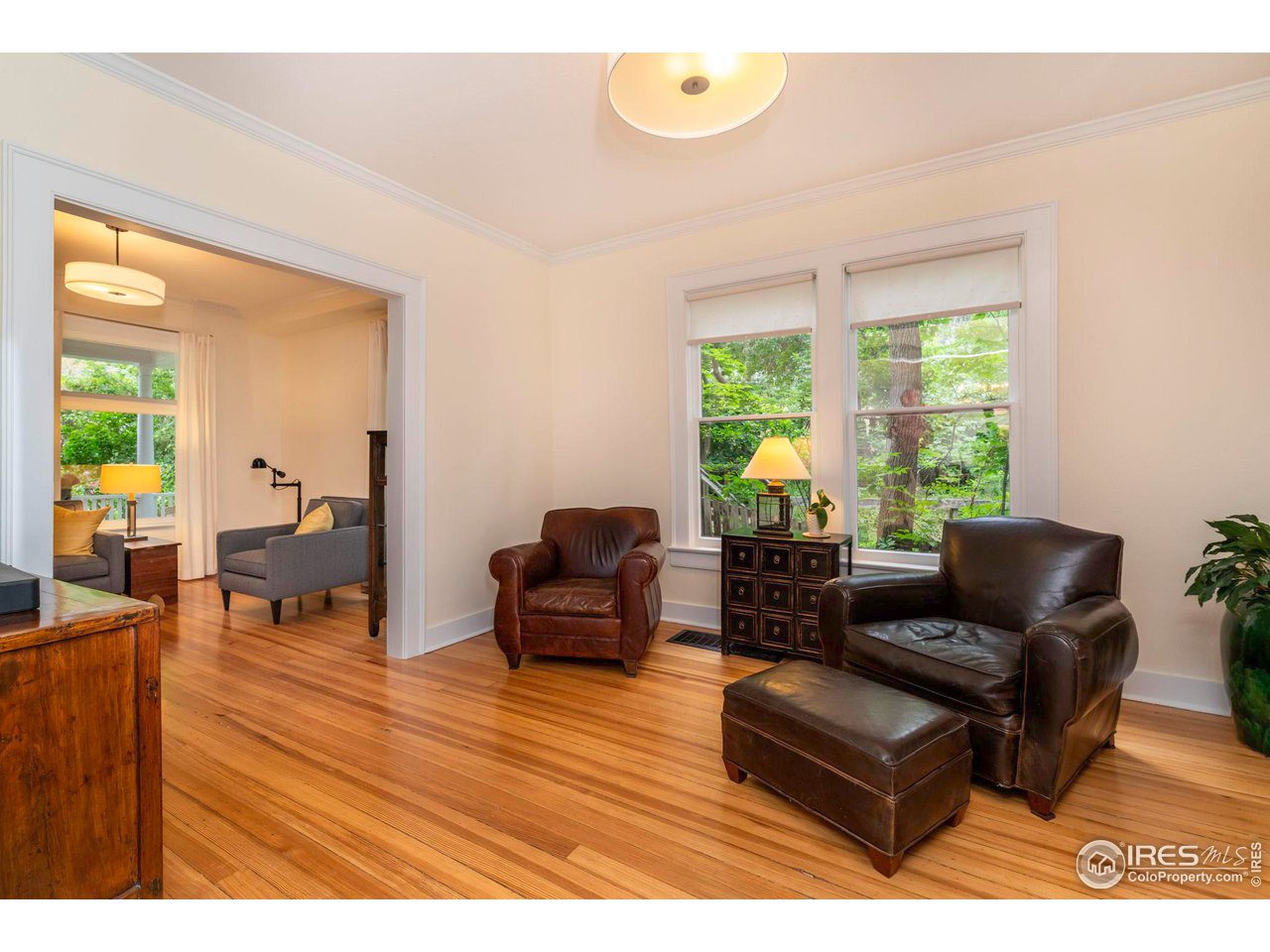 1063 Mapleton Avenue Boulder, CO 80304 - Photo 12 of 38 a living room with furniture and a large window