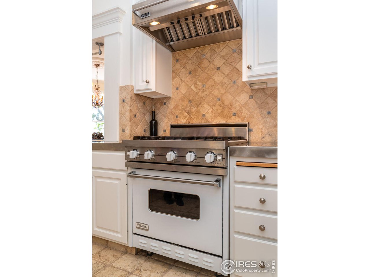 1063 Mapleton Avenue Boulder, CO 80304 - Photo 16 of 38 a stove top oven sitting inside of a kitchen