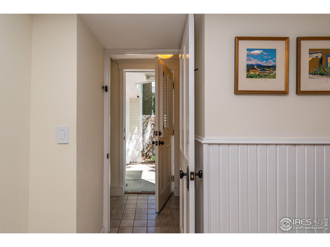 1063 Mapleton Avenue Boulder, CO 80304 - Photo 28 of 38 a view of a hallway with a wooden floor