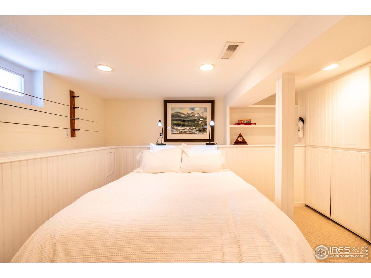 1063 Mapleton Avenue Boulder, CO 80304 - Photo 30 of 38 a large white bed in a white room