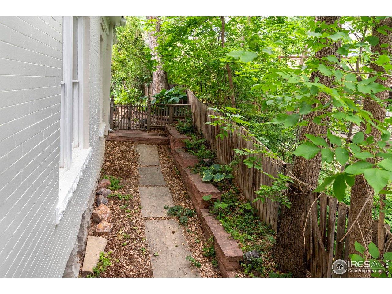 1063 Mapleton Avenue Boulder, CO 80304 - Photo 33 of 38 a view of entryway with garden