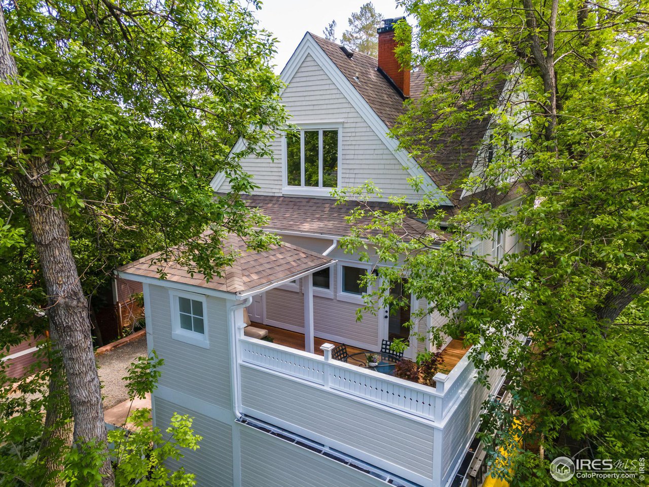1063 Mapleton Avenue Boulder, CO 80304 - Photo 34 of 38 front view of a house with a trees