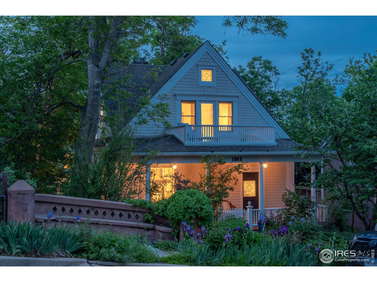 1063 Mapleton Avenue Boulder, CO 80304 - Photo 5 of 38 a view of a house with a yard